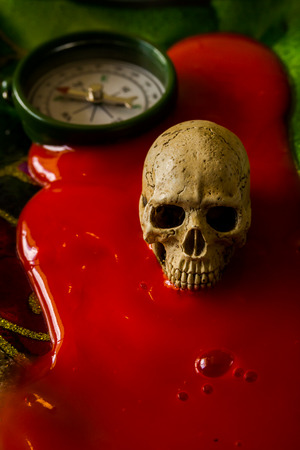 still life with skull and compass on abstract backgroundの写真素材