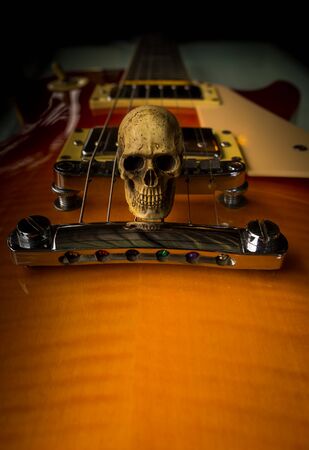 Still life with skull and electric guitarの写真素材