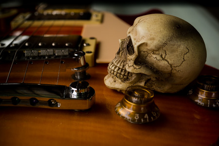 Still life with skull and electric guitarの写真素材