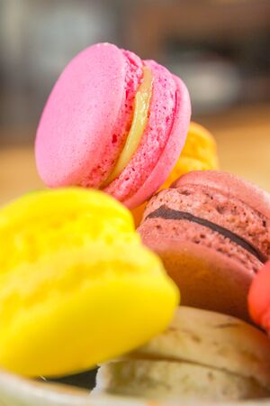 Close up colorful from row of mini macaroonsの写真素材