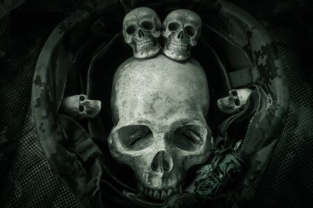 Still life with human skull in soldier helmetの写真素材