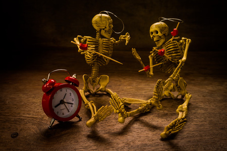 Still life with skull and clock on wooden background,Love styleの写真素材