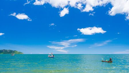 Fishing boat stop in clear sea and blue sky