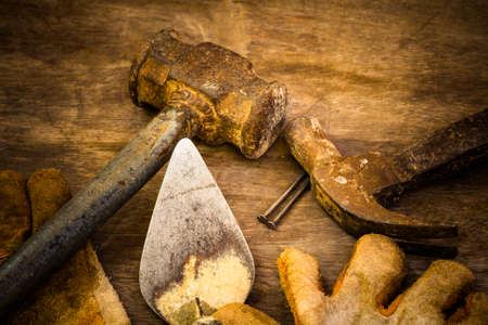 Still life with dirty tools on hard workの写真素材