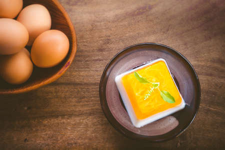 Dessert from egg on grunge background, still life styleの写真素材