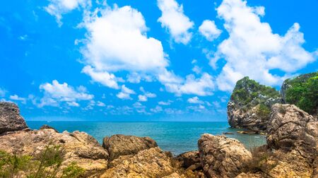 View from rock and beach in Gulf of Thailandの写真素材