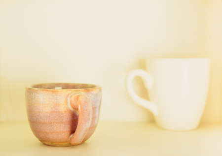 A vintage cup of coffee on wooden backgroundの写真素材