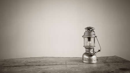 Vintage lamp on wooden and colorful backgroundの写真素材