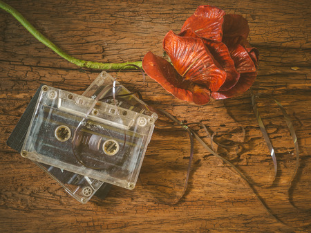 Vintage old cassette tape on wooden backgroundの写真素材