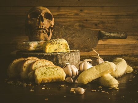 Garlic bread and cakes have expired fungus is harmful to health. Still life object