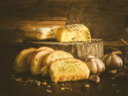 Garlic bread and cakes have expired fungus is harmful to health. Still life objectの写真素材