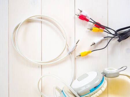 Line of jack and headphone on white backgroundの写真素材