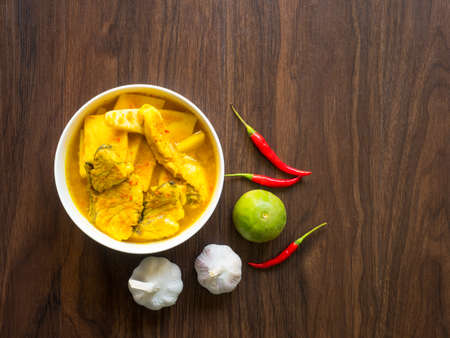 Sea snapper and coconut  with yellow spicy curry ,Thai style foodの写真素材