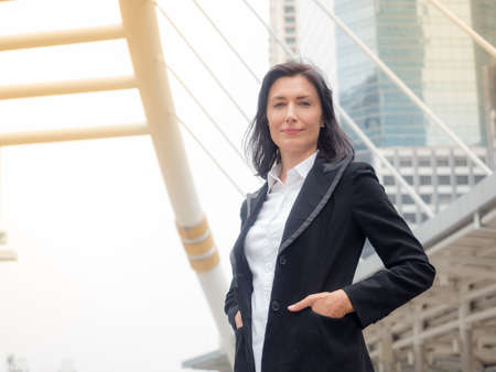 Caucasian business woman happy and smiling after successful businessの写真素材