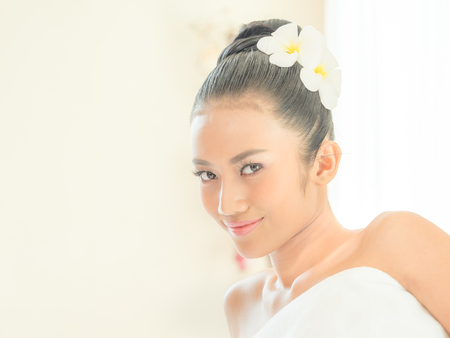 Young asian beautiful woman relaxing in spa salonの写真素材