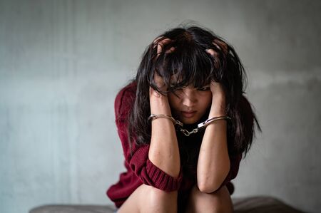 Teenage girls imprisoned with shackle, Stressed and scared Is the use of violence in organized crime...
