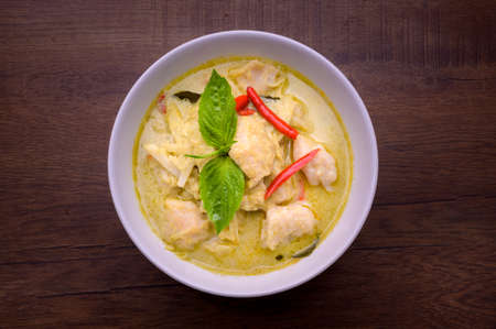 Green curry with fish balls with bamboo shoots and coconut milk from fresh coconut is a famous Thai dishの写真素材