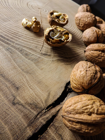 Walnuts on wooden background