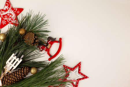 handmade Christmas gifts packed in kraft paper and decorated in eco style with natural sprigs of...