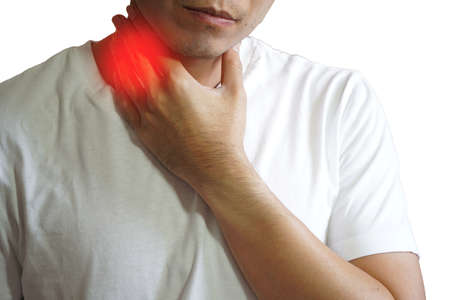 Close up man neck and shoulder pain and injury. Health care and medical concept.の写真素材