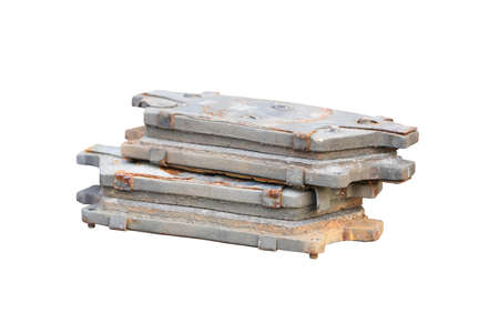 old used brake pads on white background,Old rusty brake disc from car isolated on white background,Operational safety conceptの写真素材