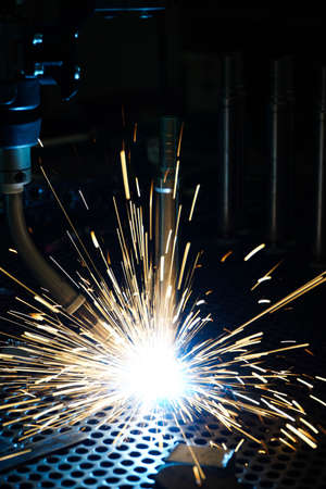 Welding of robot movement in car parts factoryの写真素材
