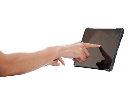 Investor watching stock market changes on tablet on white background.の写真素材