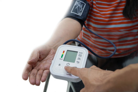 Doctor checking old female patient arterial blood pressure. Health care.Monitoring blood pressure of...