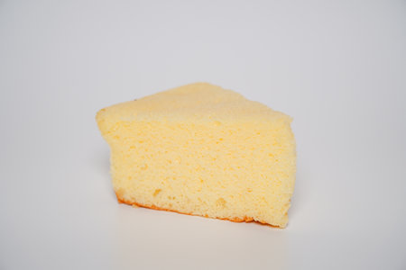 Chiffon cake with young coconut  isolated on white background, close-upの写真素材