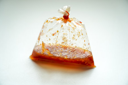 Chili Paste in Plastic Bag, White Backgroundの写真素材