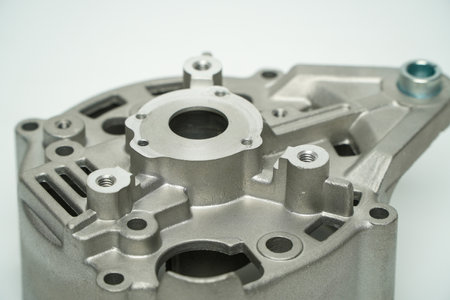 Details of metal parts in CNC machine tool manufacturing isolated on white background,production...