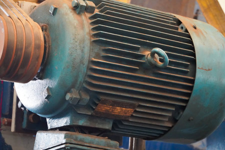 Close-up of an old electric motor in a factory, note shallow depth of fieldの写真素材