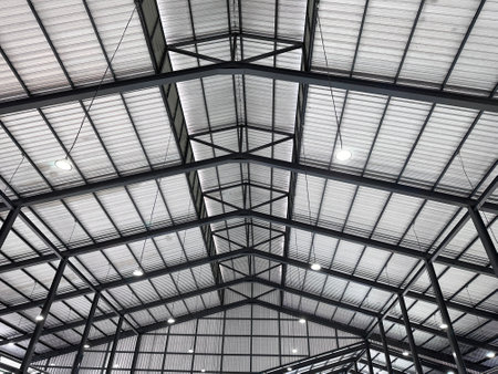 Roof of a modern building with metal roof trusses.