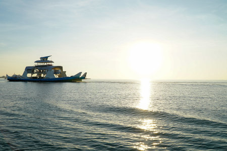 Boat in the sea at sunset
