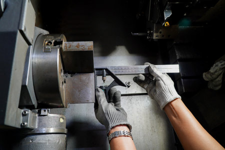 Close-up of a cnc lathe machine cutting metal.