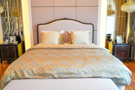 beautiful luxury hotel bedroom interior with set of pillows on bed.Stylish interior designの写真素材