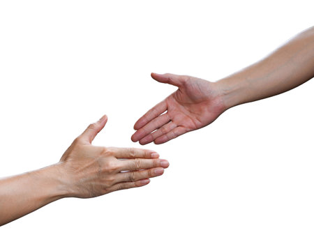 Close up of two hands reaching for each other isolated on white backgroundの写真素材