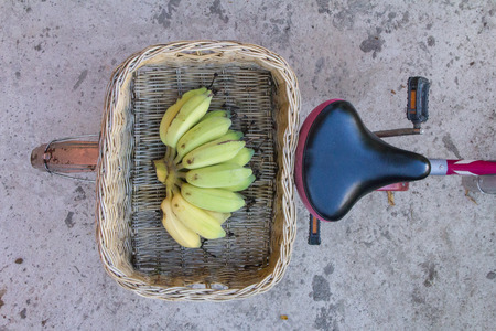 bananas in Basket with bicycleの写真素材