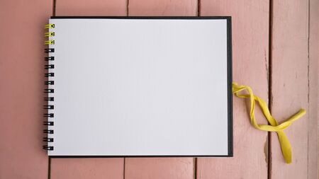 Notebook on deskの写真素材