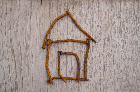 house figure on wooden background. Real Estate Concept.の写真素材