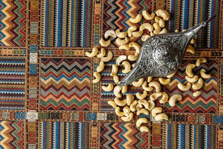 cashew nuts on a traditional Arabian carpetの写真素材