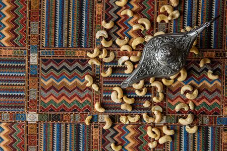 cashew nuts on a traditional Arabian carpetの写真素材