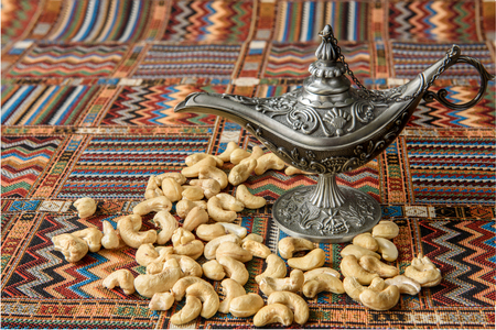 cashew nuts on a traditional Arabian carpetの写真素材