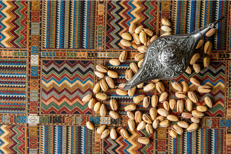 Pistachio Nuts on a traditional Arabian carpetの写真素材
