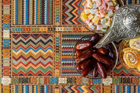 sweets on the traditional Arabian carpetの写真素材