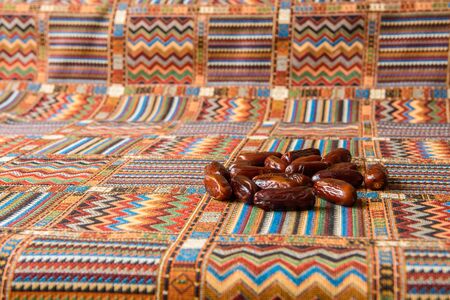 Dates on traditional Arabic carpetの写真素材