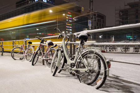 Bicycles covered with snow on the streets of European cities.のeditorial素材