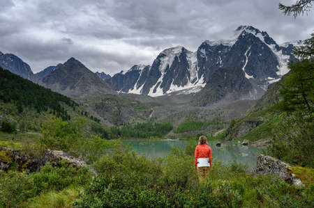 Blue water of a mountain lake. Beautiful mountain landscape. Shavlinsky lakes, Altai.の写真素材