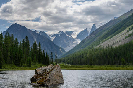 Blue water of a mountain lake. Beautiful mountain landscape. Shavlinsky lakes, Altai.の写真素材