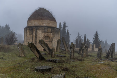 Mausoleum and tombstones at an old cemetery in Azerbaijan.の写真素材
